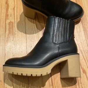 LUG SOLE black faux leather boot with heel